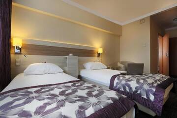 Фото номера Двухместный номер с 2 отдельными кроватями Отель Comfort by Trio г. Белосток 20
