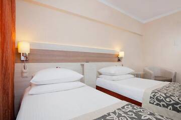 Фото номера Двухместный номер с 2 отдельными кроватями Отель Comfort by Trio г. Белосток 21