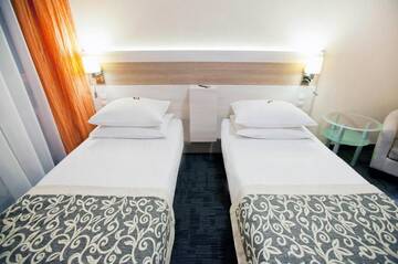 Фото номера Двухместный номер с 2 отдельными кроватями Отель Comfort by Trio г. Белосток 24
