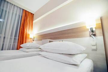 Фото номера Двухместный номер с 2 отдельными кроватями Отель Comfort by Trio г. Белосток 25