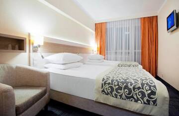 Фото номера Двухместный номер с 2 отдельными кроватями Отель Comfort by Trio г. Белосток 8