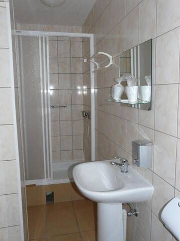 Фото номера Двухместный номер с 2 отдельными кроватями Отель Hotel Turystyczny г. Белосток 4