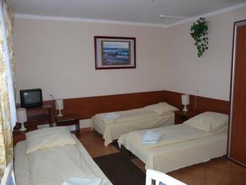 Фото номера Трехместный номер Отель Hotel Turystyczny г. Белосток 4