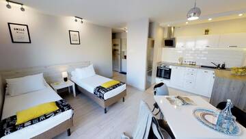 Фото номера Апартаменты с балконом - 6 Suraska Street Апартаменты Rint - Centrum Rynek Kościuszki г. Белосток 4