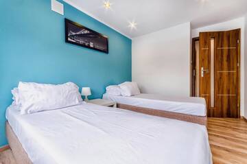 Фото номера Апартаменты - Pilsudskiego Street, 5 Апартаменты Rint - Centrum Piłsudskiego г. Белосток 16