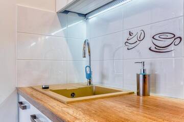 Фото номера Апартаменты - Pilsudskiego Street, 5 Апартаменты Rint - Centrum Piłsudskiego г. Белосток 25