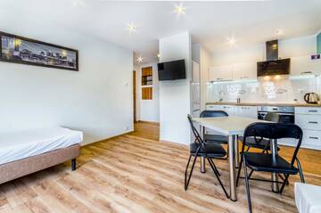 Фото номера Апартаменты - Pilsudskiego Street, 5 Апартаменты Rint - Centrum Piłsudskiego г. Белосток 7